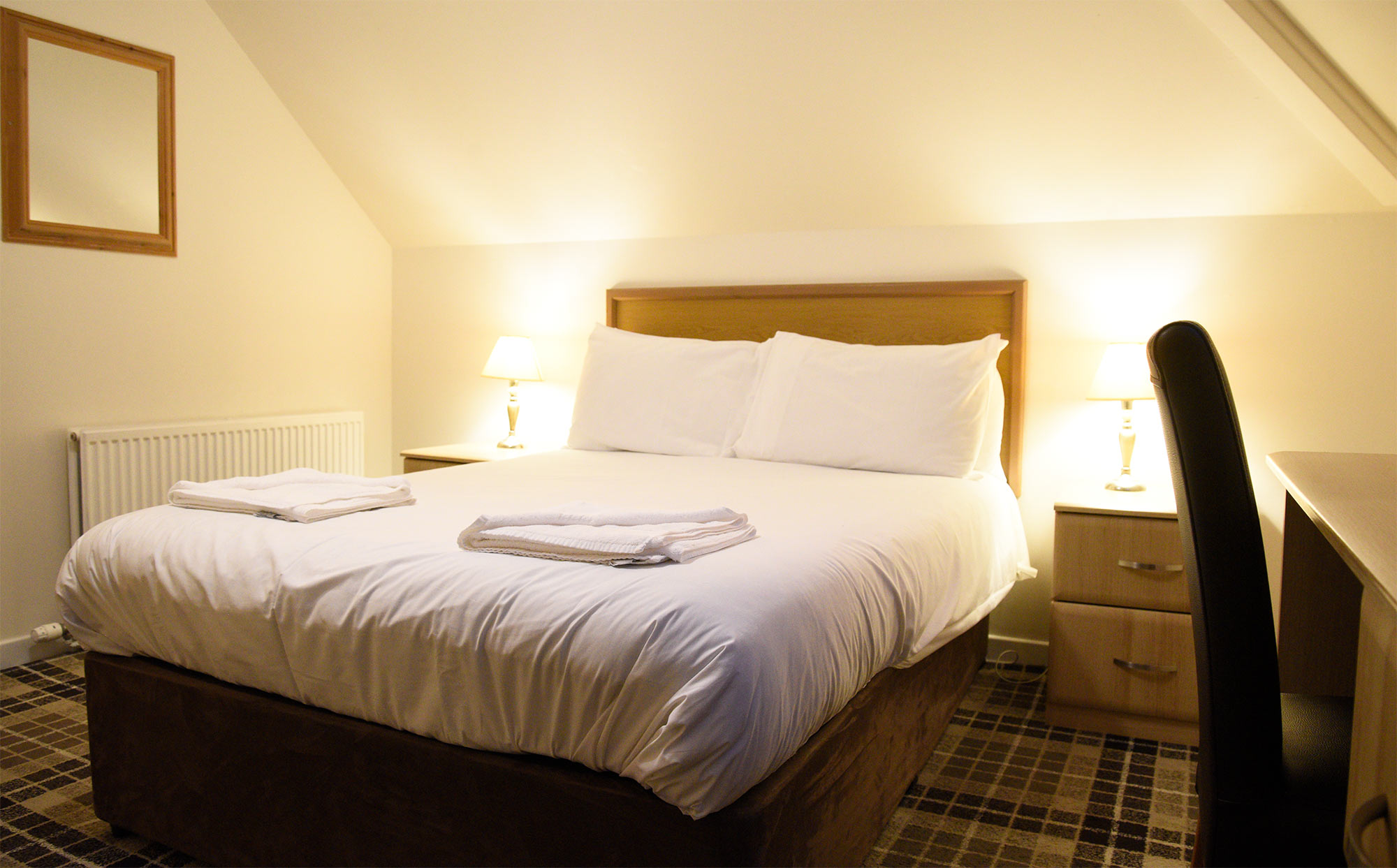 Comfortable Portree Hotel double room with WIFI en suite tea coffee making facilities on Skye